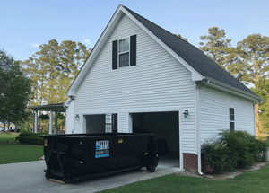 Image of a 10 yard dumpster at a residential job site